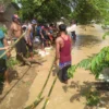 Tanggul Jebol, Warga Desa Muara Menunggu Bantuan